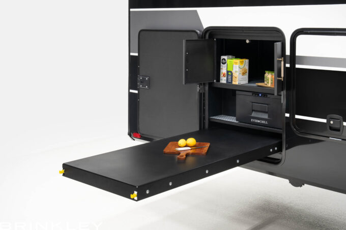 | Model R Full Profile Fifth Wheel Line 19 Model R Fifth Wheels Exterior Outdoor Kitchen Prep Table 2027 Brinkley RV