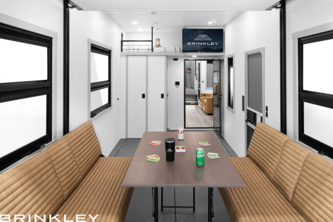 Brinkley Fold n’ Stow Table is a fifth wheel toy hauler garage ready for game night.
