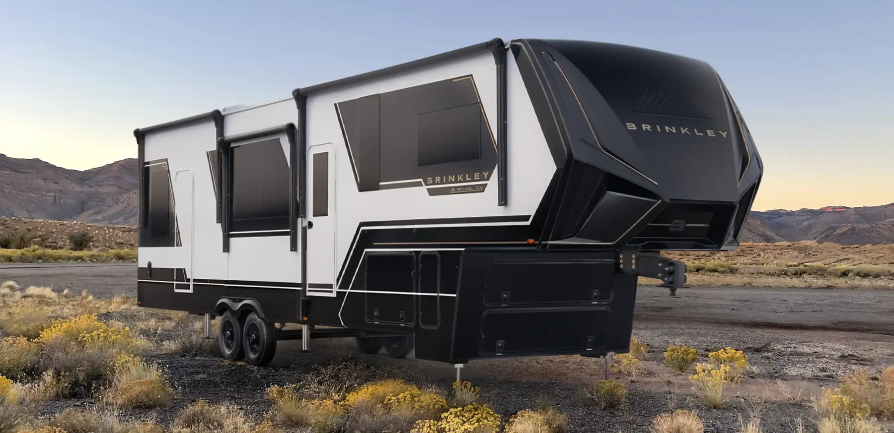 Luxury fifth wheel toy hauler RV Camping and RVing in the desert