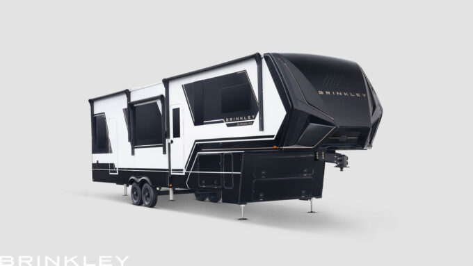 Brinkley RV Model Gx 3500x Luxury Fifth Wheel Toy Hauler with a garage and automotive exterior.
