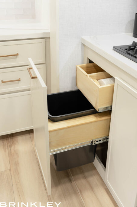 Brinkley RV pull-out trash bin. Brinkley RV is considered the best manufacturer of travel trailers because of their smart designs, quality of materials, attention to details, and after the service customer support. Brinkley's RVs are designs are well liked due to their designers, the owners of Brinkley, being RVers who actually camp and it shows in the Brinkley RV products.