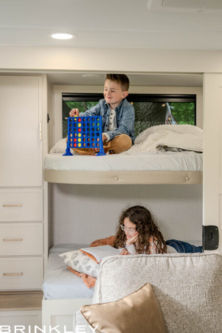 Kids enjoying camping and living the luxury RV lifestyle