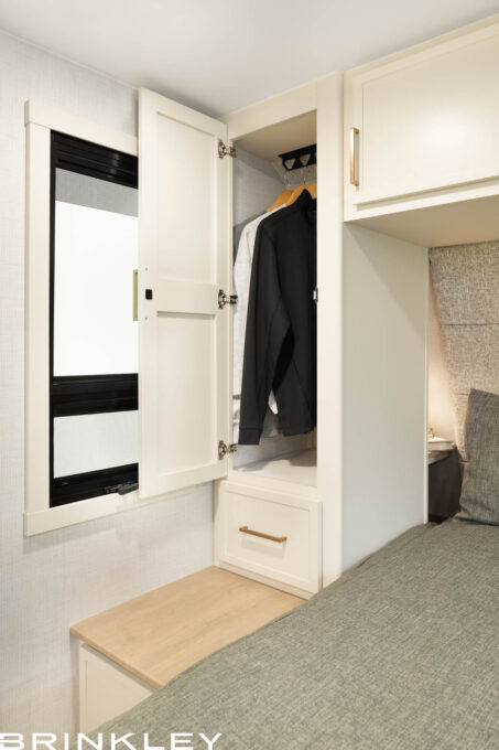 Dual wardrobes with hanging rods and drawers in a Brinkley RV Model Ix 20x short small compact travel trailer.