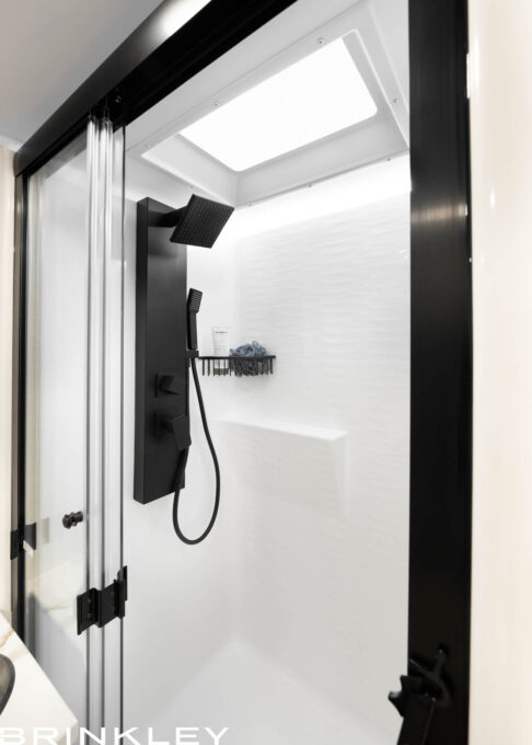 23x bathroom featuring a 36x30 molded fiberglass shower with Dotless Neo LED lighting and residential sprayer