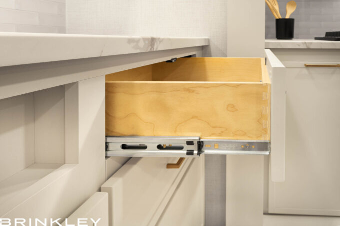 Luxury RV interior showing premium hardwood dovetail drawer construction and residential-grade cabinetry.