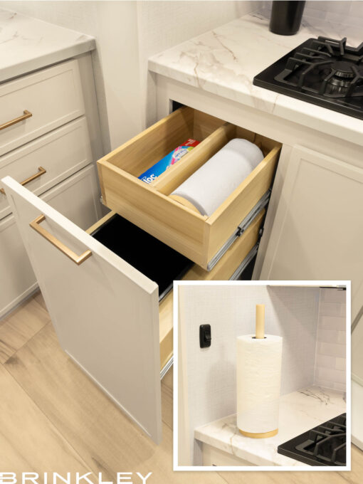 Travel Trailer kitchen featuring the Brinkley Panty Dropper, a portable Stow 'n Go paper towel caddy.