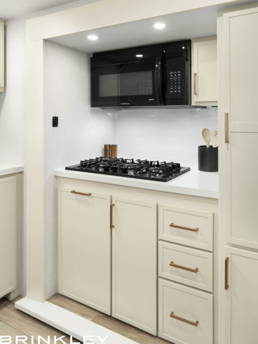 | Model I 26x Travel Trailers 13 Model Ix 26x Travel Trailers Kitchen Stove Microwave 2027 Brinkley RV 6685